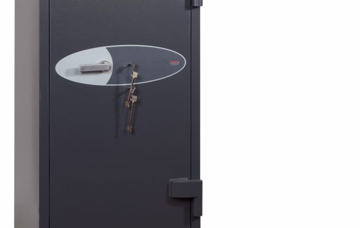 This Phoenix Safe Planet HS6075K is a euro grade 4 commercial safe that can be used as as domestic safe and retail safe. Its image shows this 1310mm tall safe in a graphite grey paint finish and its door closed. When opened it shows its 3 way angular bolts . What is hidden is its double wall construction, filled with a special concrete formulation, its anti drill plates and re-locking devices on both its key locks.