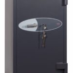 This Phoenix Safe Planet HS6075K is a euro grade 4 commercial safe that can be used as as domestic safe and retail safe. Its image shows this 1310mm tall safe in a graphite grey paint finish and its door closed. When opened it shows its 3 way angular bolts . What is hidden is its double wall construction, filled with a special concrete formulation, its anti drill plates and re-locking devices on both its key locks.