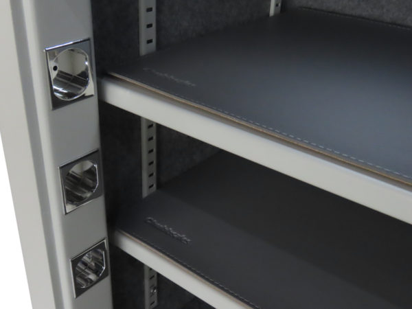 This is a closeup of the Chubbsafes HomeVault S2 55el shelves with faux leather pads and chrome accents on its bolt holders.